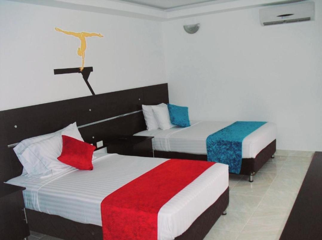 Aw Hotel Sport Cali Bagian luar foto