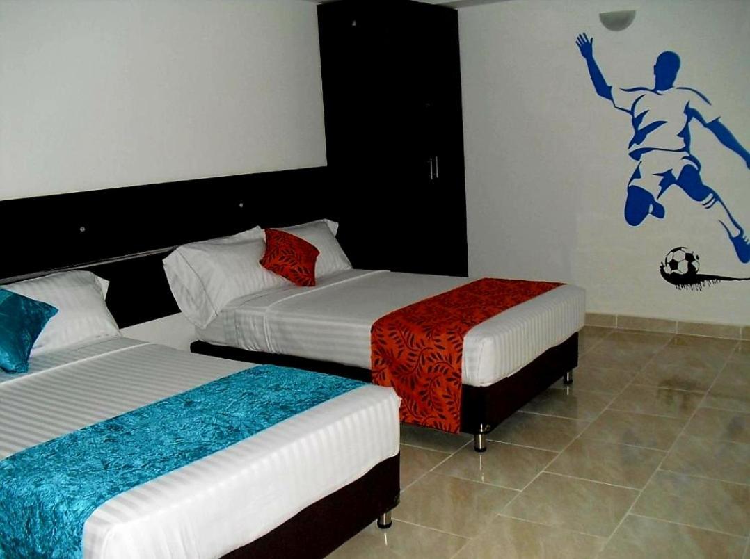 Aw Hotel Sport Cali Bagian luar foto