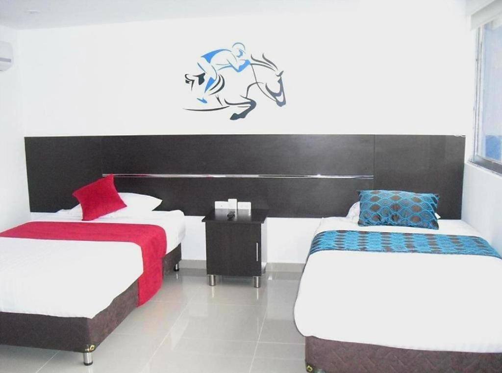 Aw Hotel Sport Cali Bagian luar foto