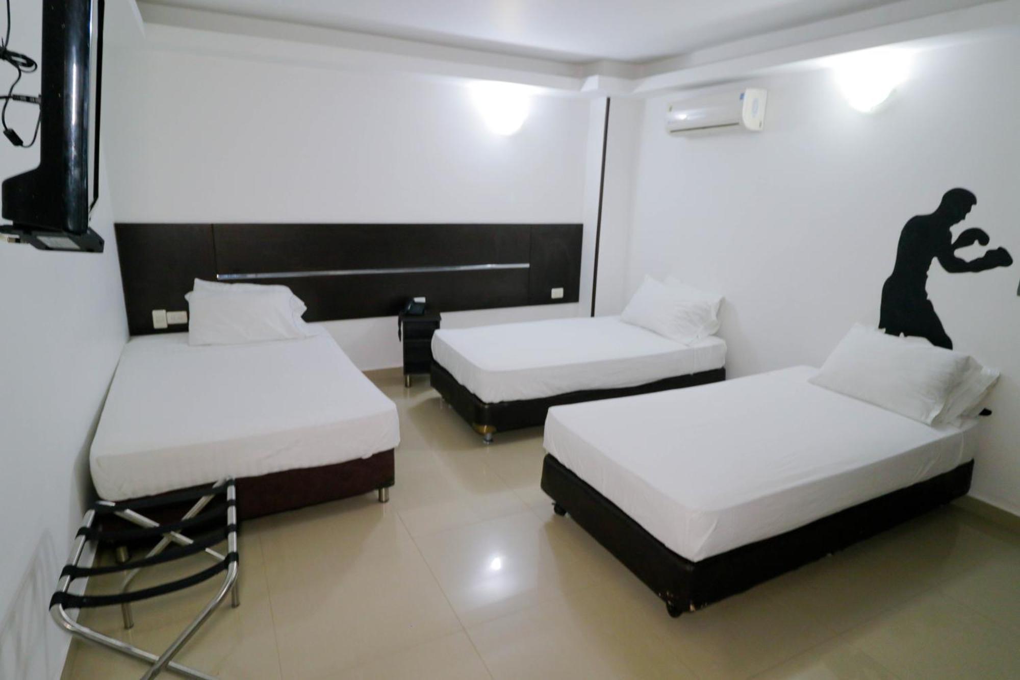 Aw Hotel Sport Cali Bagian luar foto